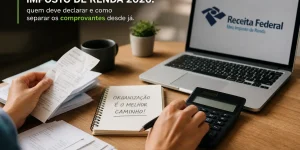 Pessoa organizando documentos de Imposto de Renda 2026